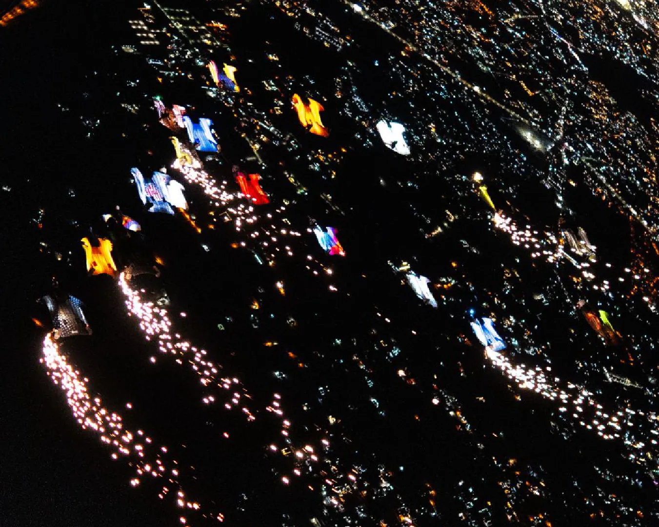 Largest wingsuit formation at night